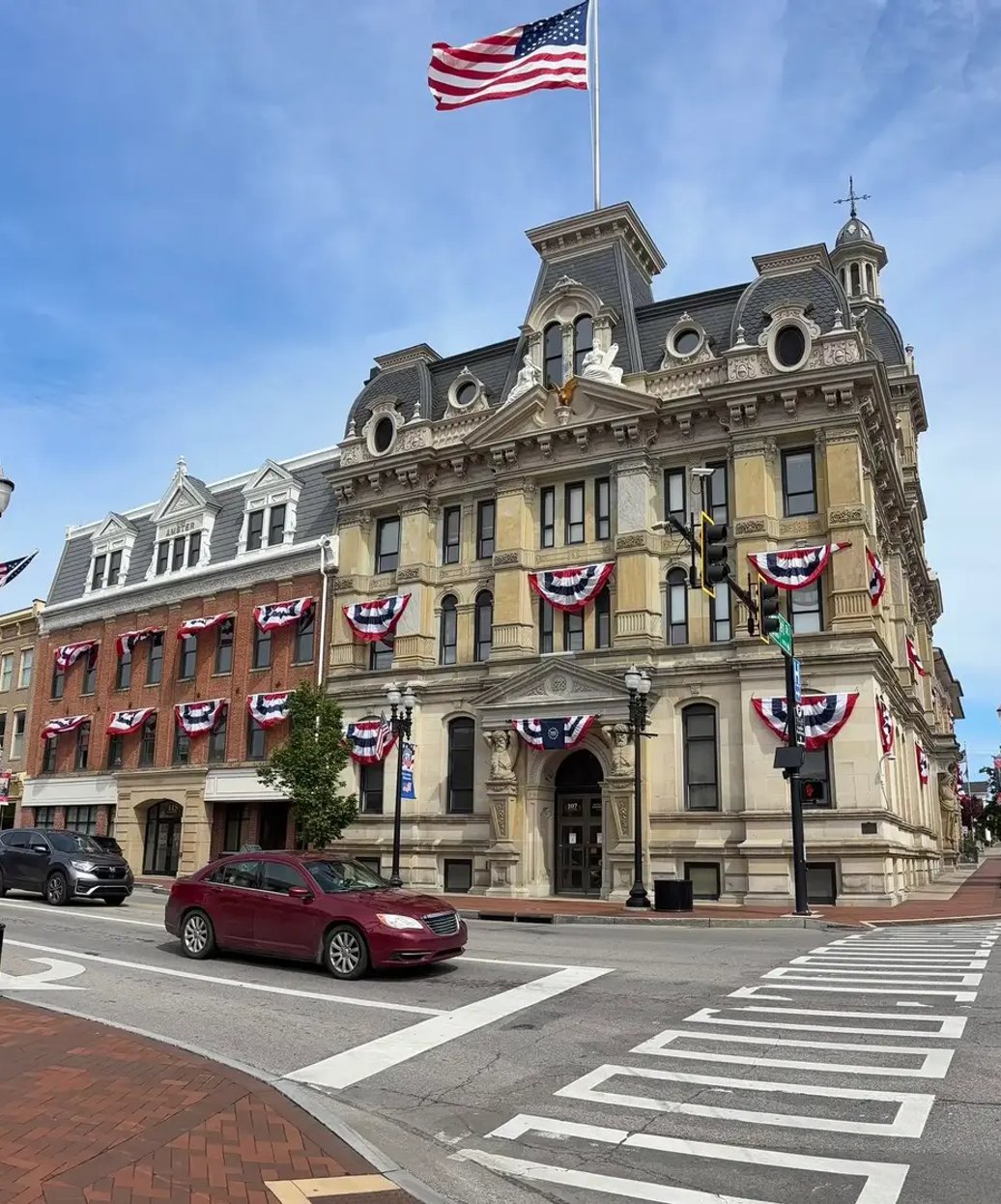 Historic downtown Wooster Ohio building on Public Square, decorated for a summer holiday